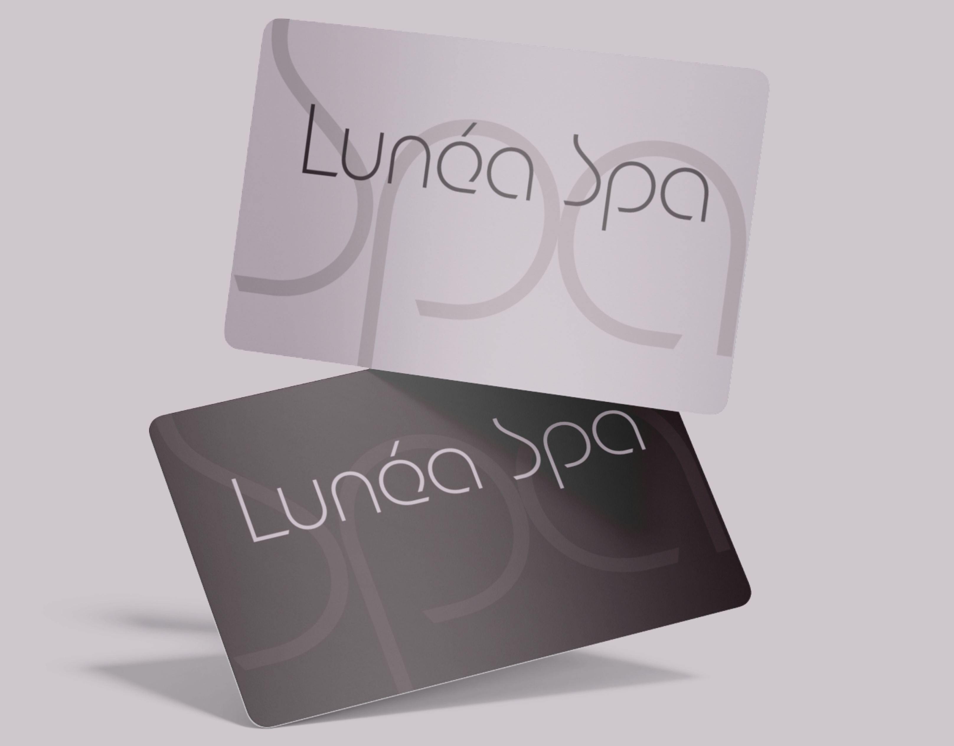 Подарочные карты Lunéa Spa в изысканной композиции - дизайн, вдохновленный движением воздуха и ощущением прикосновения.